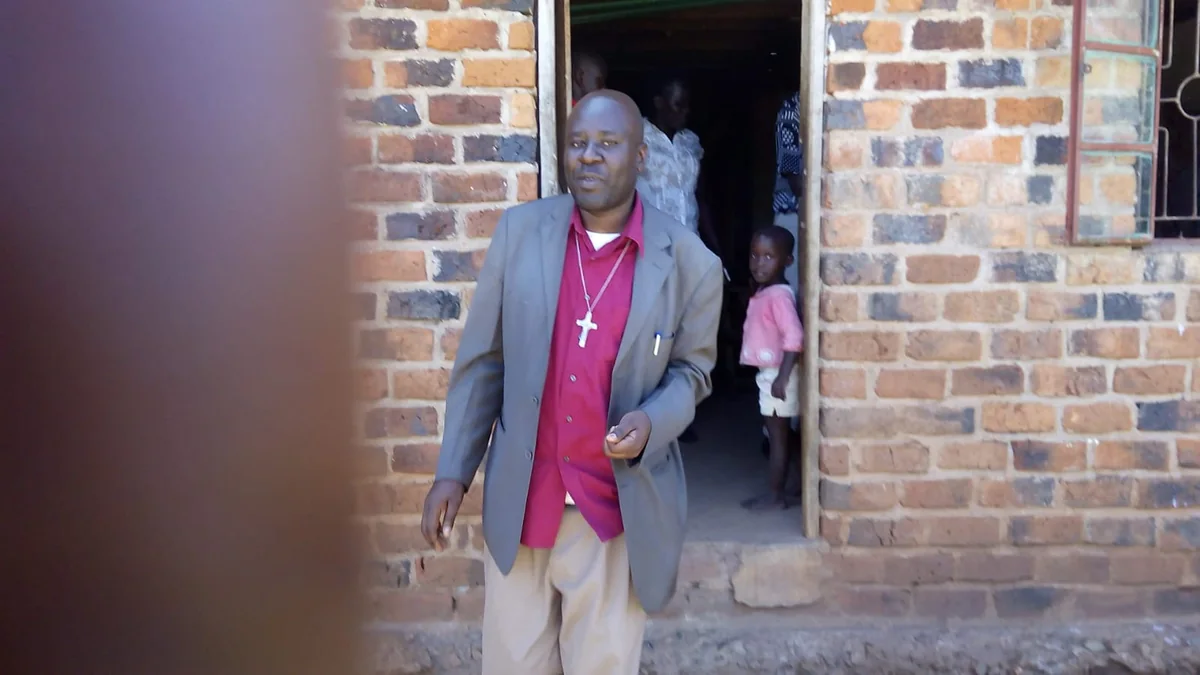 Bishop Willis Ouma Ondiek during a community visit
